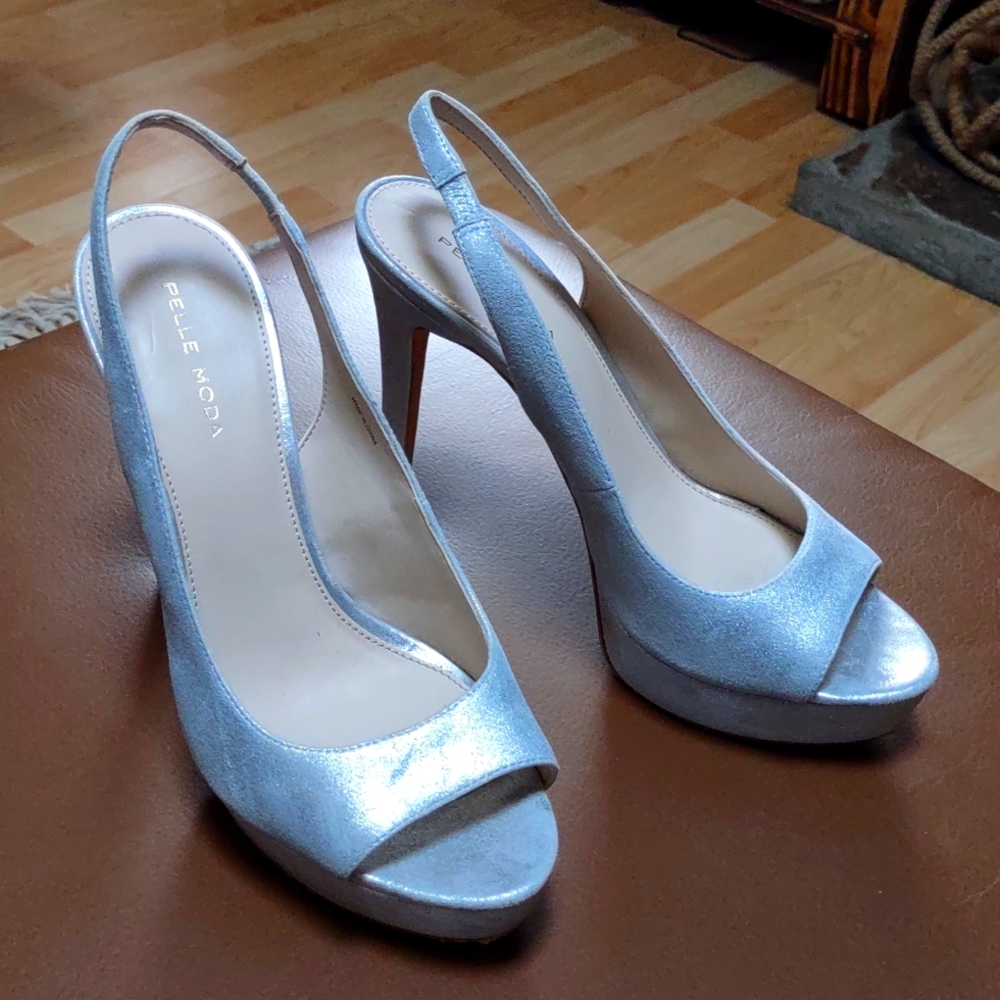 Pelle moda sz9 platform stiletto sexy silver heels.Lots of life left.Barely worn